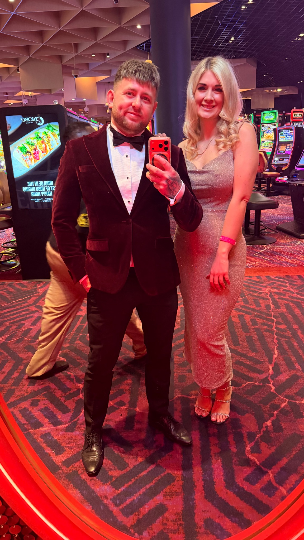 Ash and Tanya dressed up at a casino event